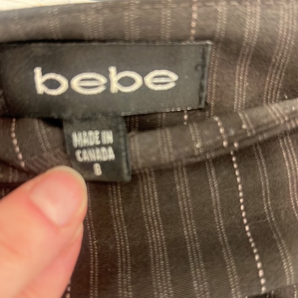 Womens Bebe size 8 Brown skirt. Great flair at bottom! Tan and cream pinstripes - Picture 6 of 6